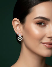 Two pairs of stud earrings