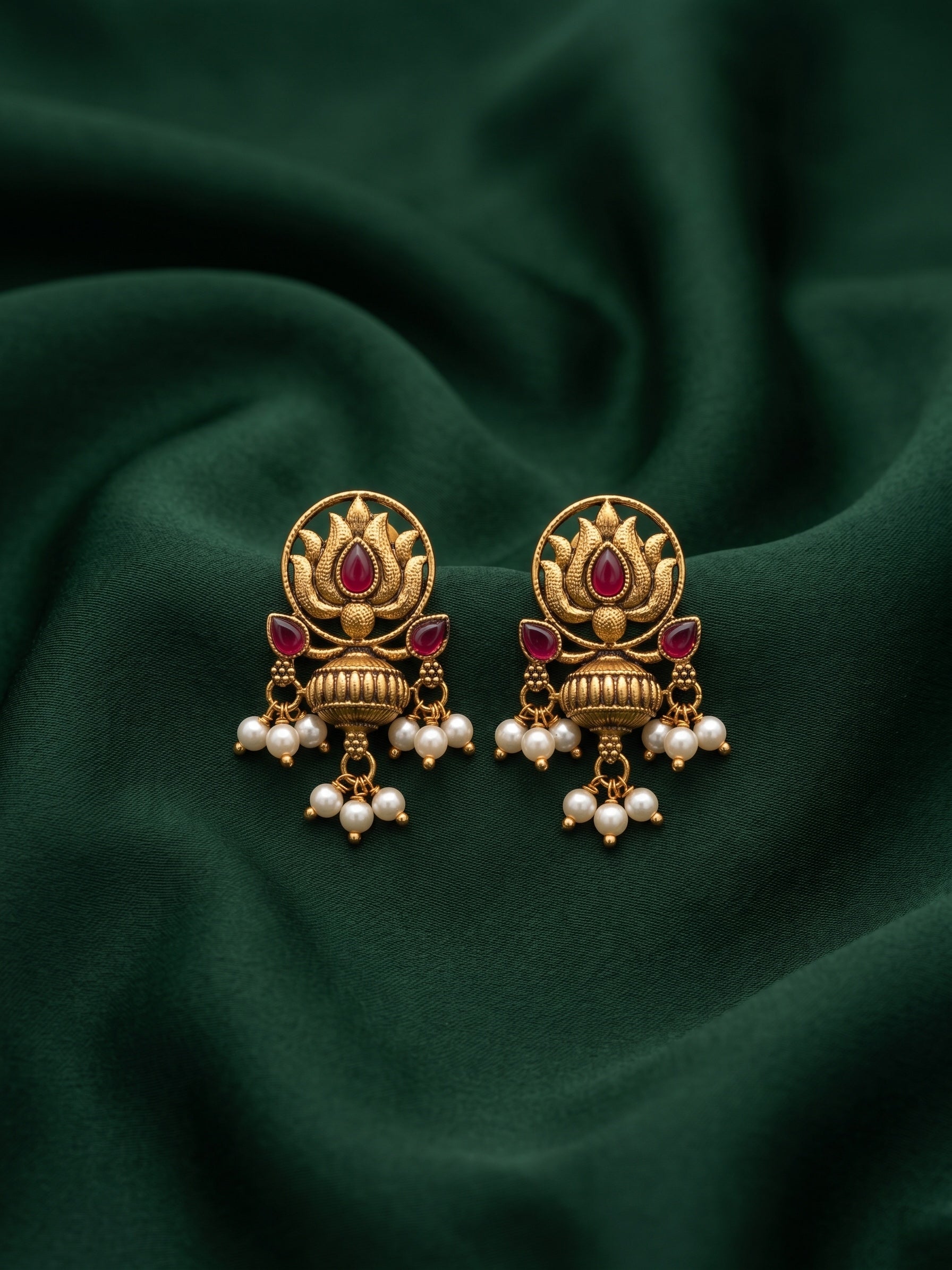 Women Antique Gold-Plated Lotus Motif Stud Earrings with Pink Stones & Pearl