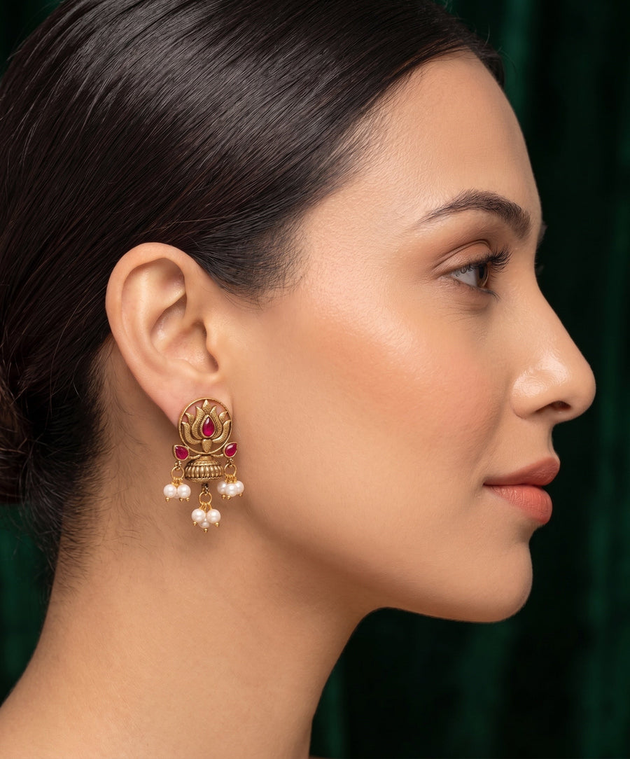 Women Antique Gold-Plated Lotus Motif Stud Earrings with Pink Stones & Pearl