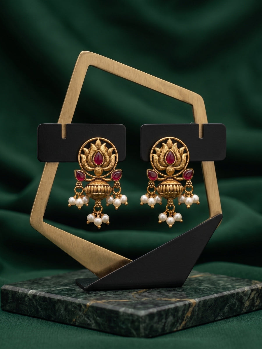 Women Antique Gold-Plated Lotus Motif Stud Earrings with Pink Stones & Pearl