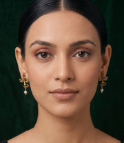 Women Antique Gold-Plated Goddess Durga Face Stud Earrings with Green Stones & Pearls
