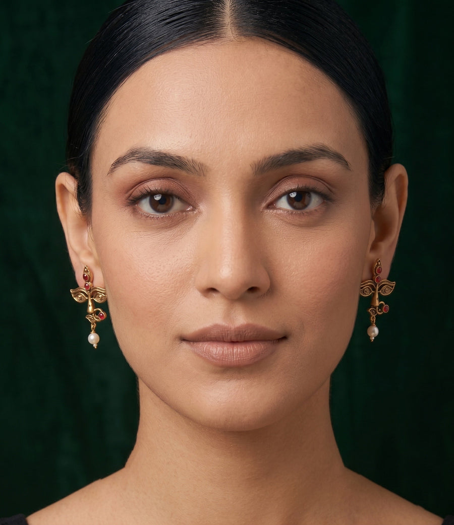 Women Antique Gold-Plated Goddess Durga Face Stud Earrings with Green Stones & Pearls