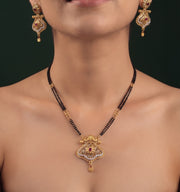 Premium Gold-Toned Zircon AD Stone Mangalsutra With Matching Earrings